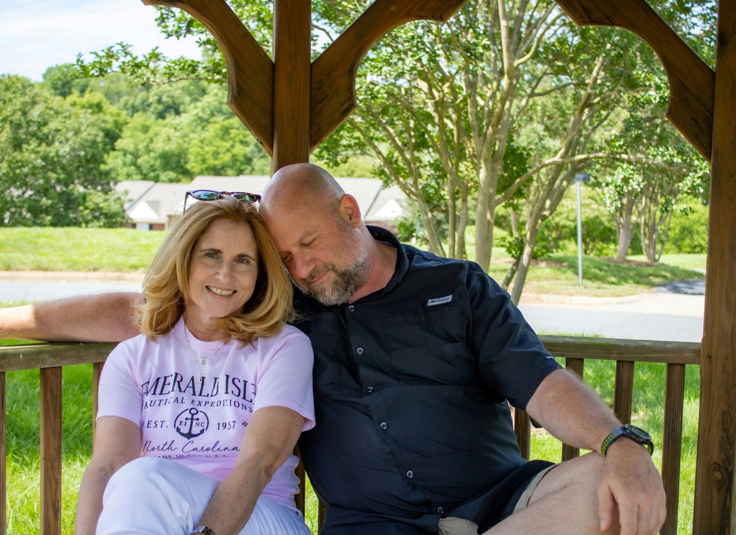 John and LeAnn Cox sitting outside